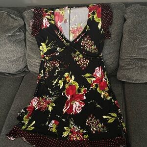 Women’s black dress with beautiful flower print.